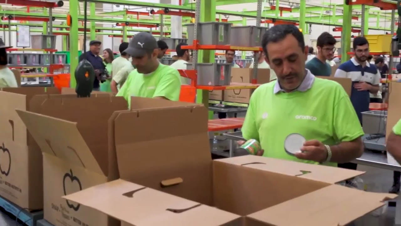 Aramco Employees package items for Hurricane Harvey help