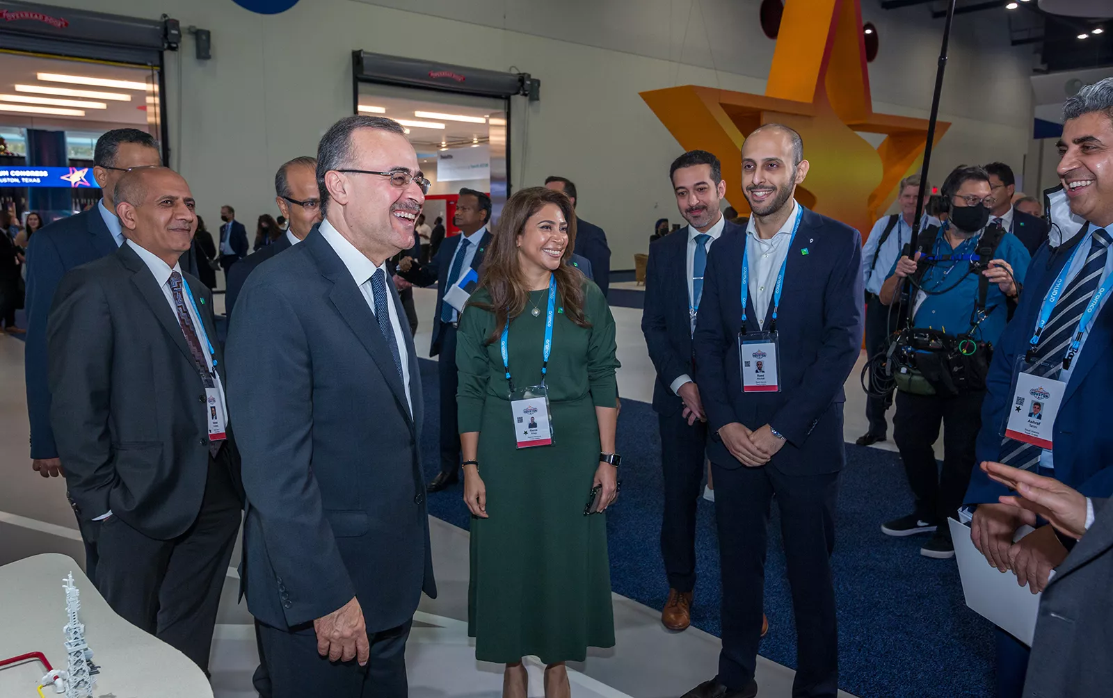 Amin Nasser takes time to meet with members of Aramco Americas at the Aramco booth during the World Petroleum Congress held this week.