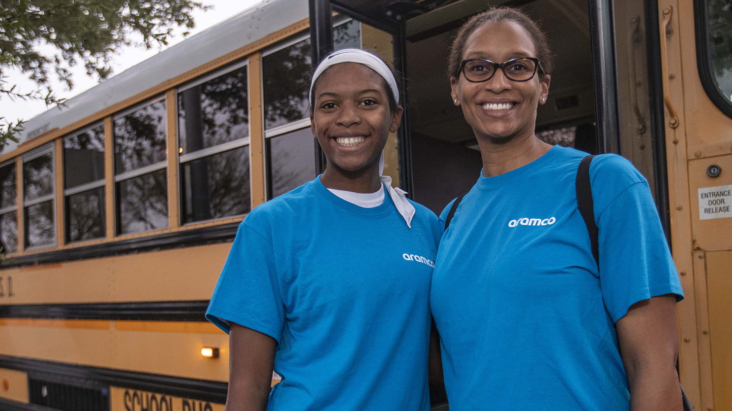 Aramco Americas’ Jessica Burgess, right, with her daughter, Amiah, at the 2020 event.
